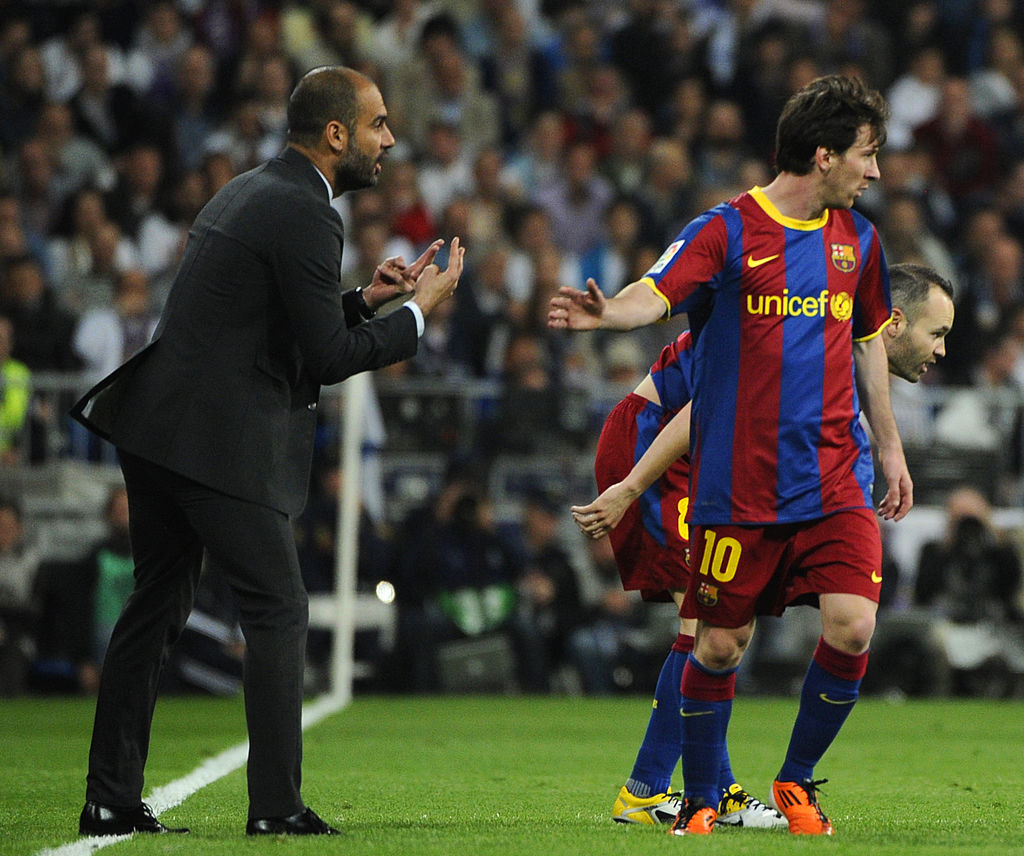 Barcelona's coach Josep Guardiola (L) sp